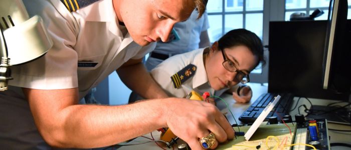 Students at ϲ, a military college in Virginia, performing opto electronic research.