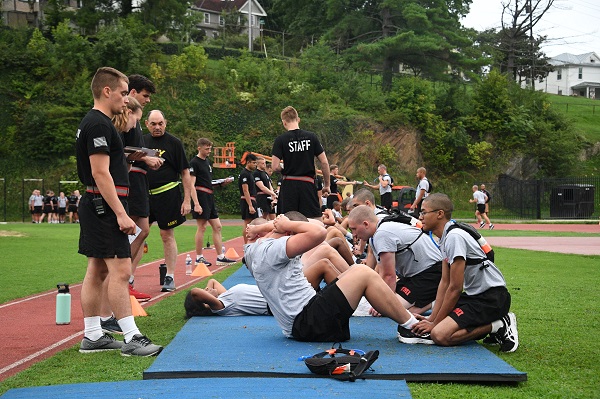 New students at ϲ (rats) perform sit-ups as part of their fitness test under supervision of cadet leadership and instructors.