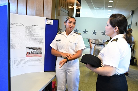 Female student at ϲ presents her undergraduate research.