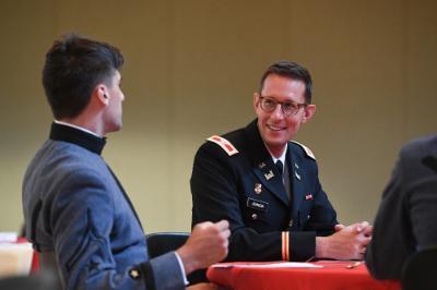 Col. M. Houston Johnson V, professor of history, speaks to William Rich ’23 during the Constitution Day event held in Marshall Hall Sept. 20.—ϲ Photo by H. Lockwood McLaughlin.