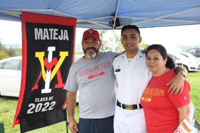 Members of the Mateja family pose at their tailgating tent during the 2021 Family Weekend on post. —ϲ Photo by H. Lockwood McLaughlin