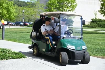 Students from ϲ work a computer controlled golf cart on the military school's campus in Lexington, Virginia